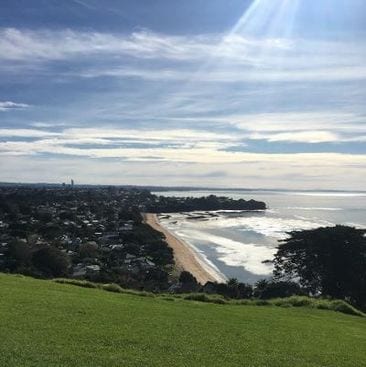 Picture by Auckland for Kids - View of Cheltenham Beach in Auckland, New Zealand