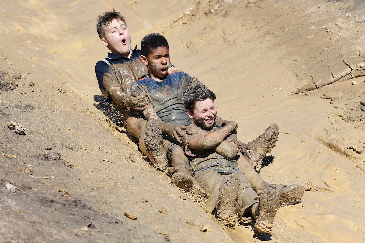Boys having fun at Mud Monster Rush