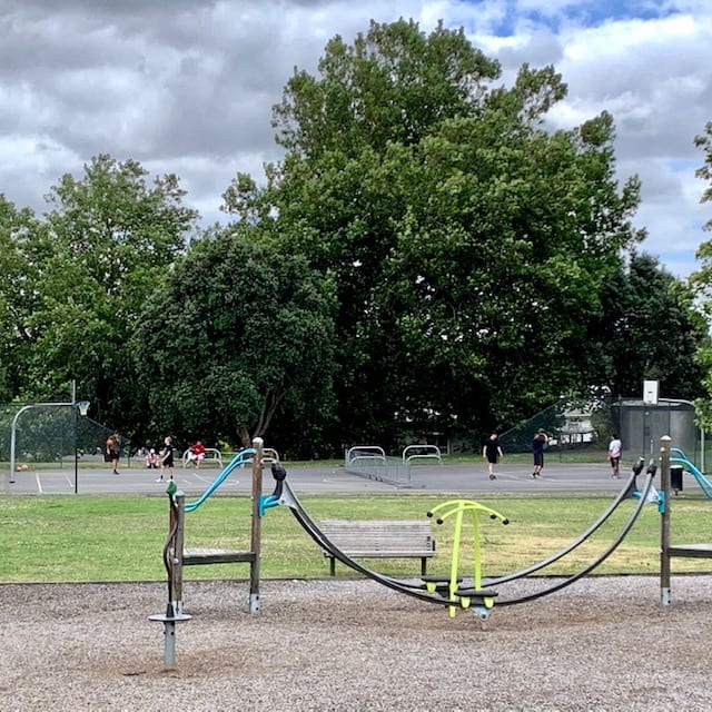 Exercise equipment and basketball court at Grey Lynn Park