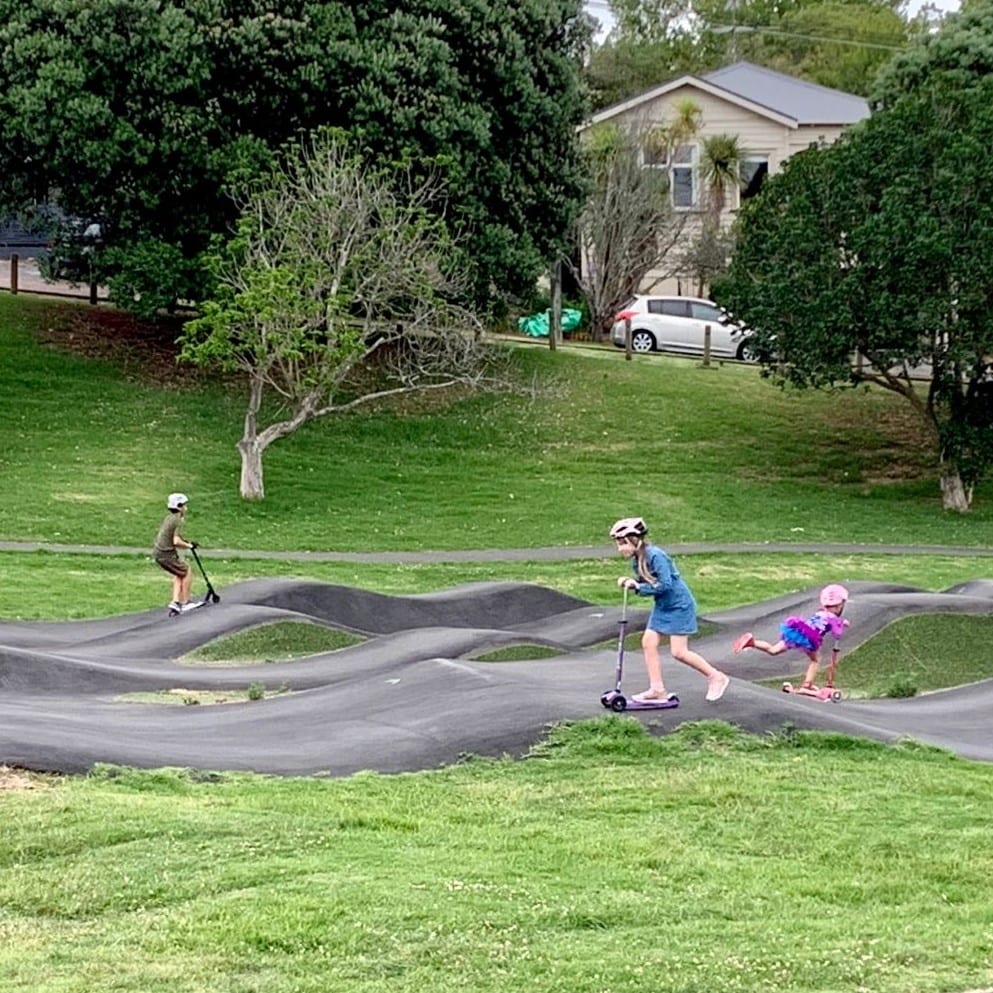 Children playing on the Grey Lynn Pump Track at Grey Lynn Park | Auckland for Kids