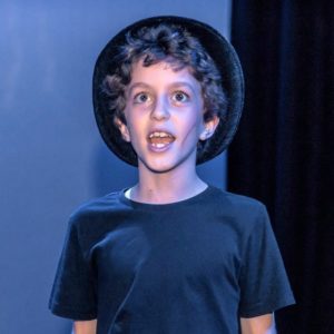 Kids Up Front boy acting at holiday workshop