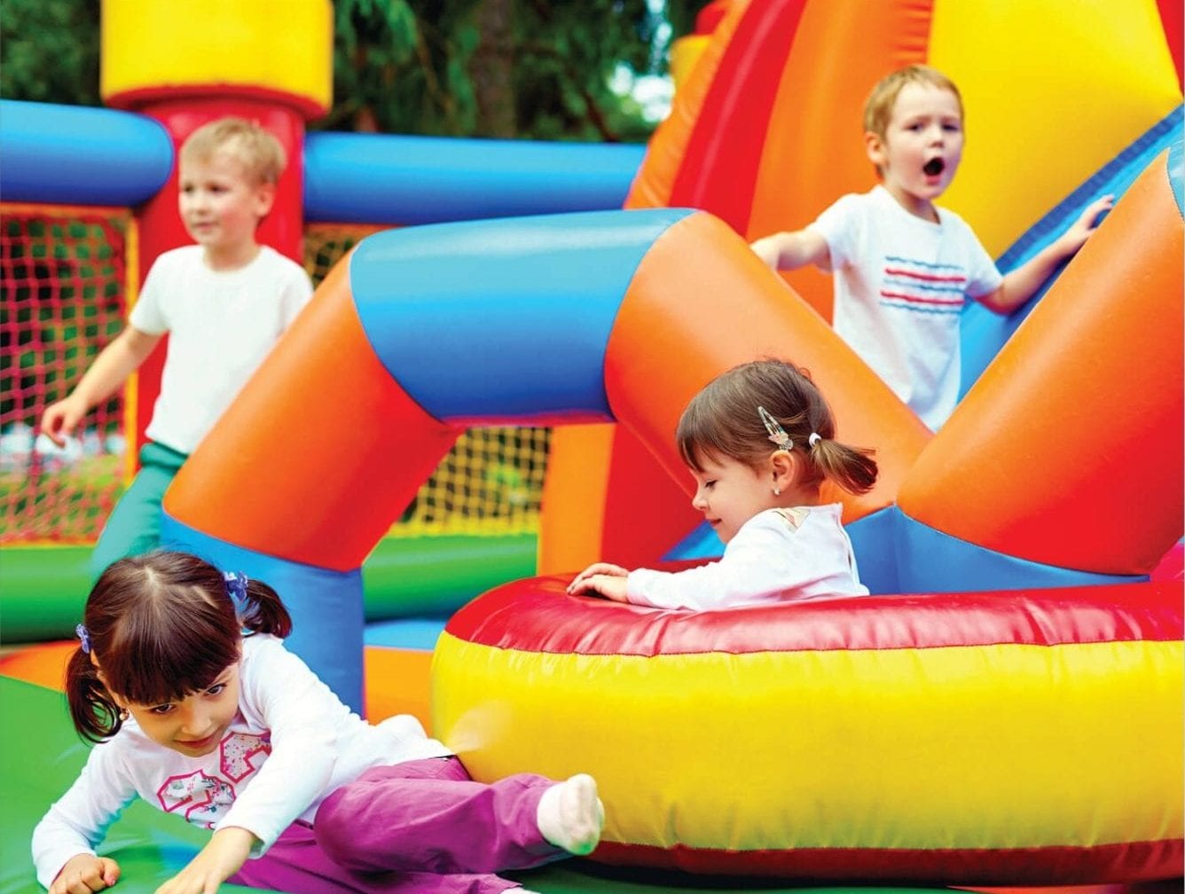 Kids playing on bouncy castle