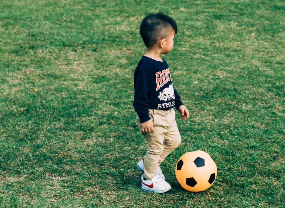 Child playing with a ball