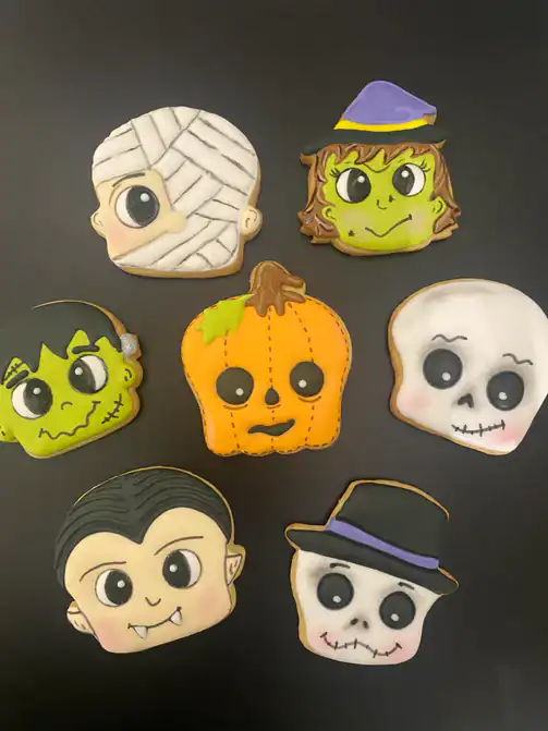 Cute halloween face cookies made by Anna Bates
