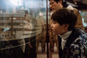 Boy looking at boat model at the Maritime Museum
