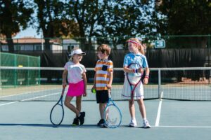 Children on tennis court