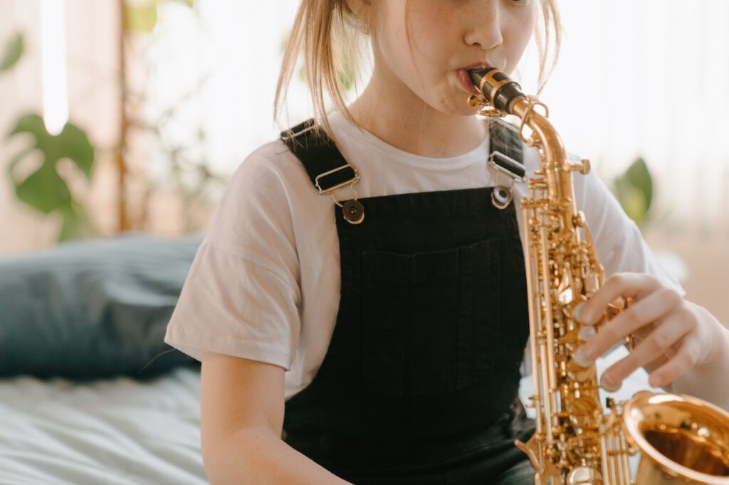 Child playing the saxophone