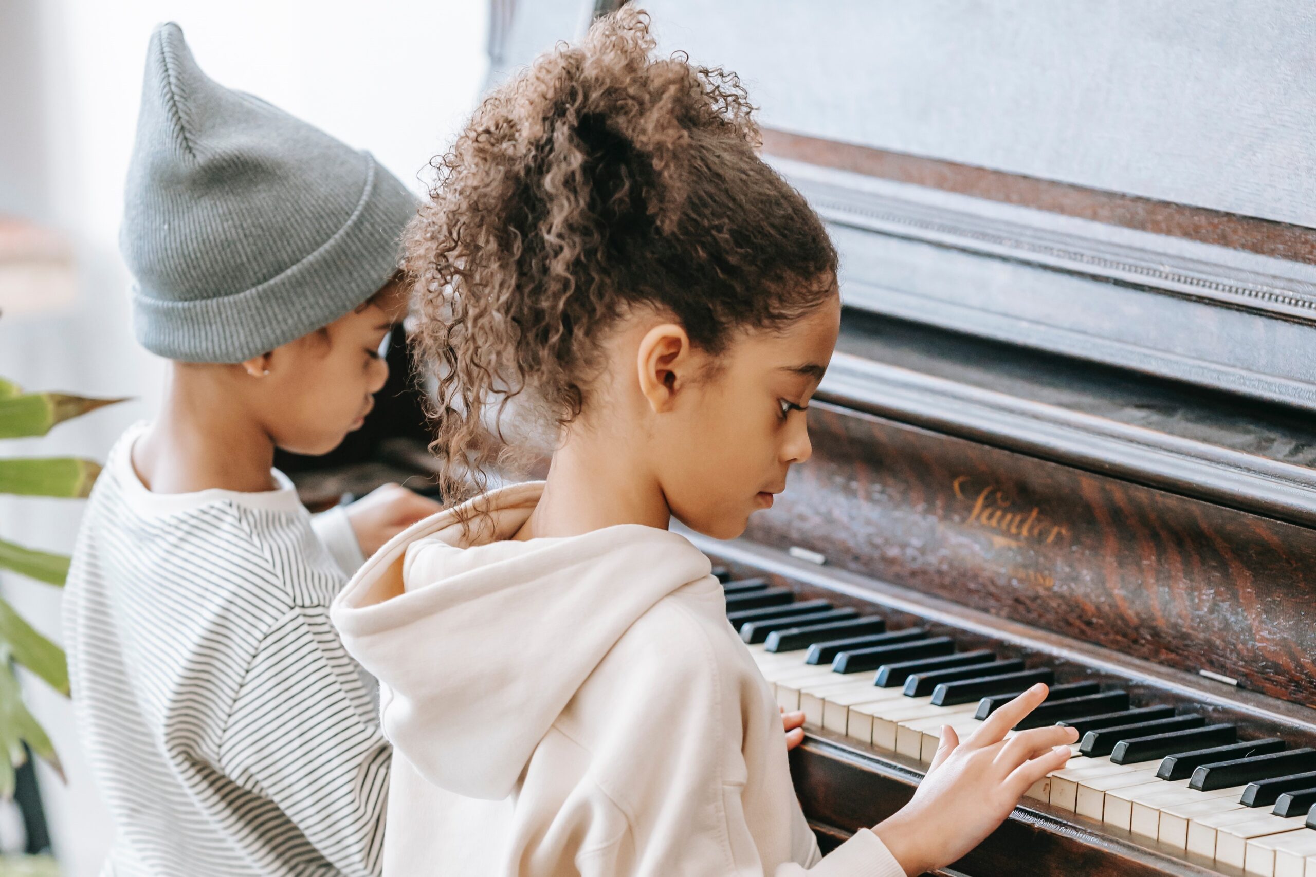 Children playing the piano