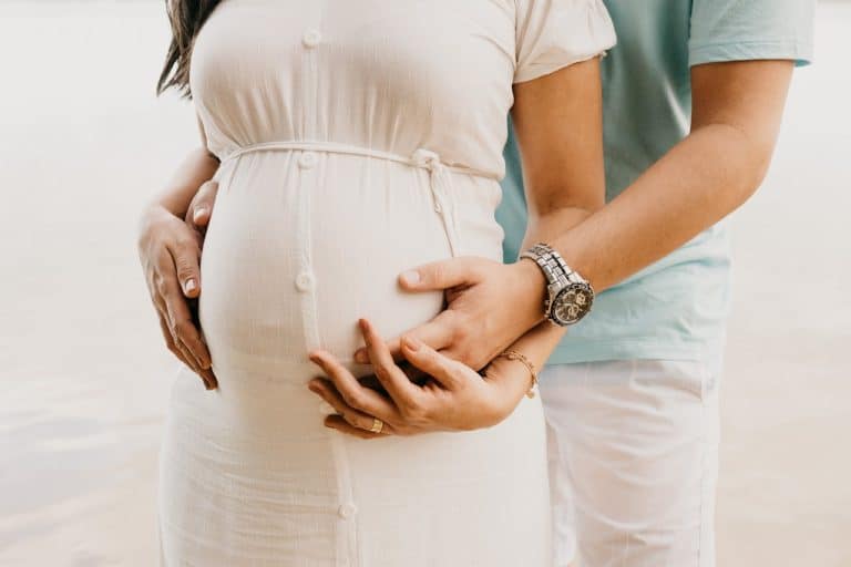 Pregnant women with her partner