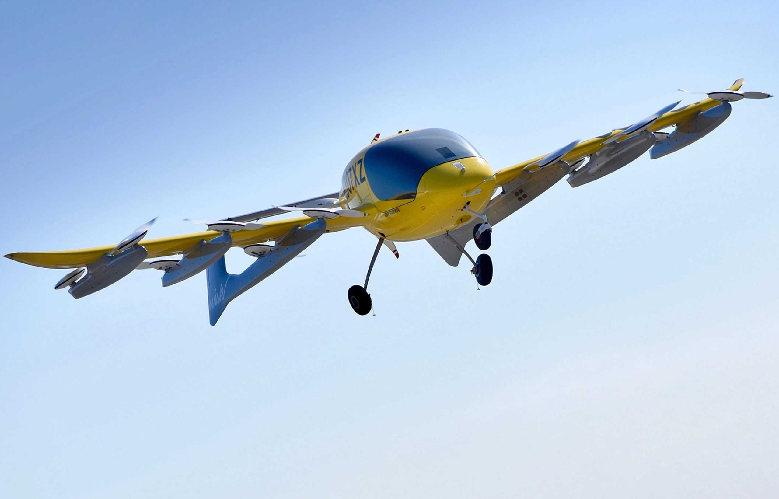 Wisk Generation 5 Cora electric vertical take-off and landing aircraft in flight against a clear sky.
