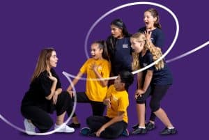 Children at a musical class with National Youth Theatre