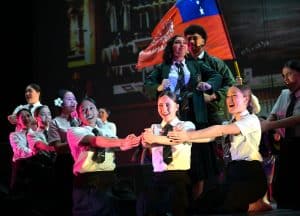 Rangatahi performing a haka theatre piece together at Autaia in Auckland