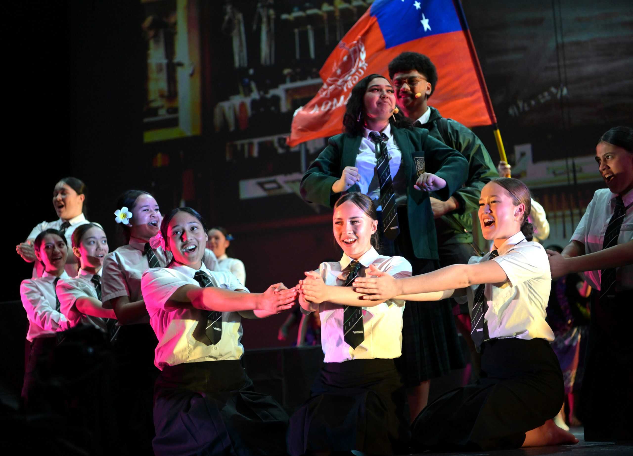 Rangatahi performing a haka theatre piece together at Autaia in Auckland