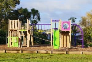 Kaikoura Reserve Playground in Henderson with slides and climbing structures – photo by Playco Playgrounds