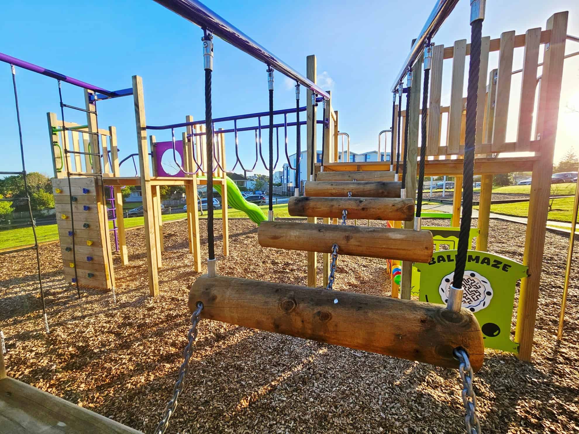 Rope and log balance bridge at Kaikoura Reserve Playground in Henderson – photo by Playco Playgrounds